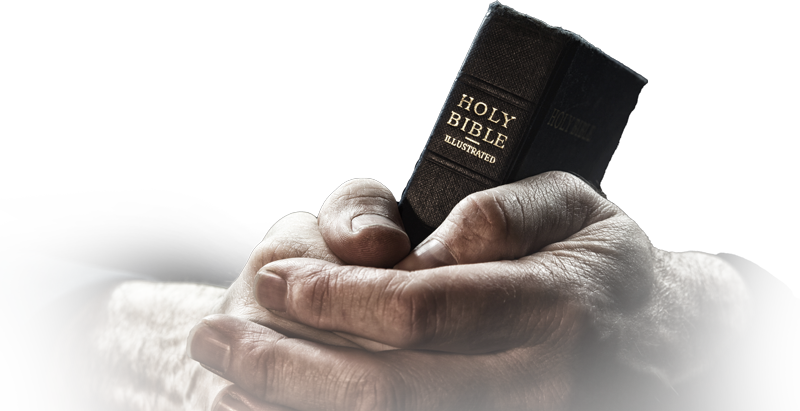 holding the Holy Bible