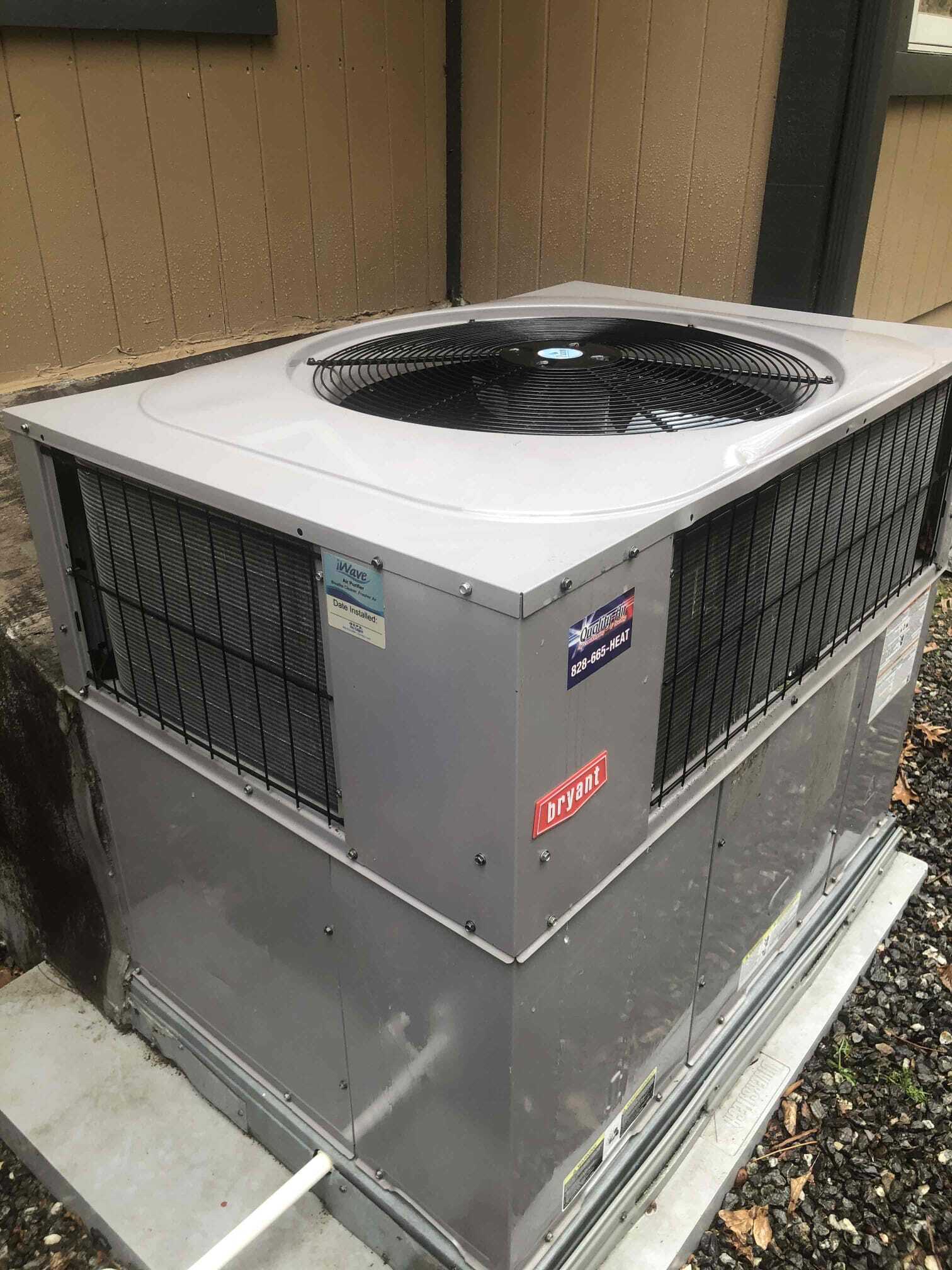 Bryant machine with stickers of Air Quality and iWave — Asheville, NC — Quality Air