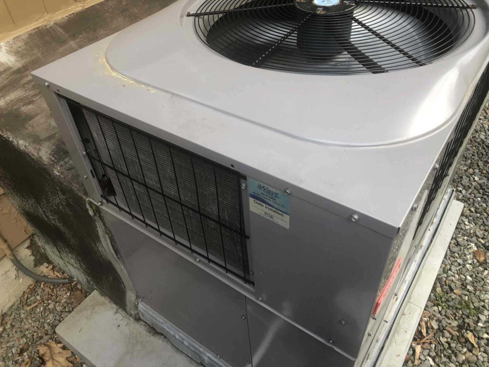 HVAC machine with iWave sticker — Asheville, NC — Quality Air