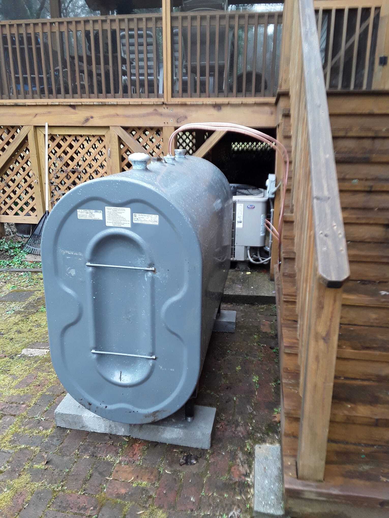 HVAC machine beside stairs — Asheville, NC — Quality Air