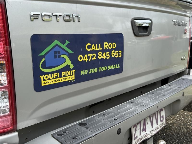 Rear Tailgate With Youfi Fixit Signage — Youfi Fixit Handyman Services in Edmonton, QLD