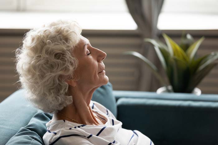Woman Enjoying Air at Home — Lino Lakes, MN — Rite-Way Waterproofing