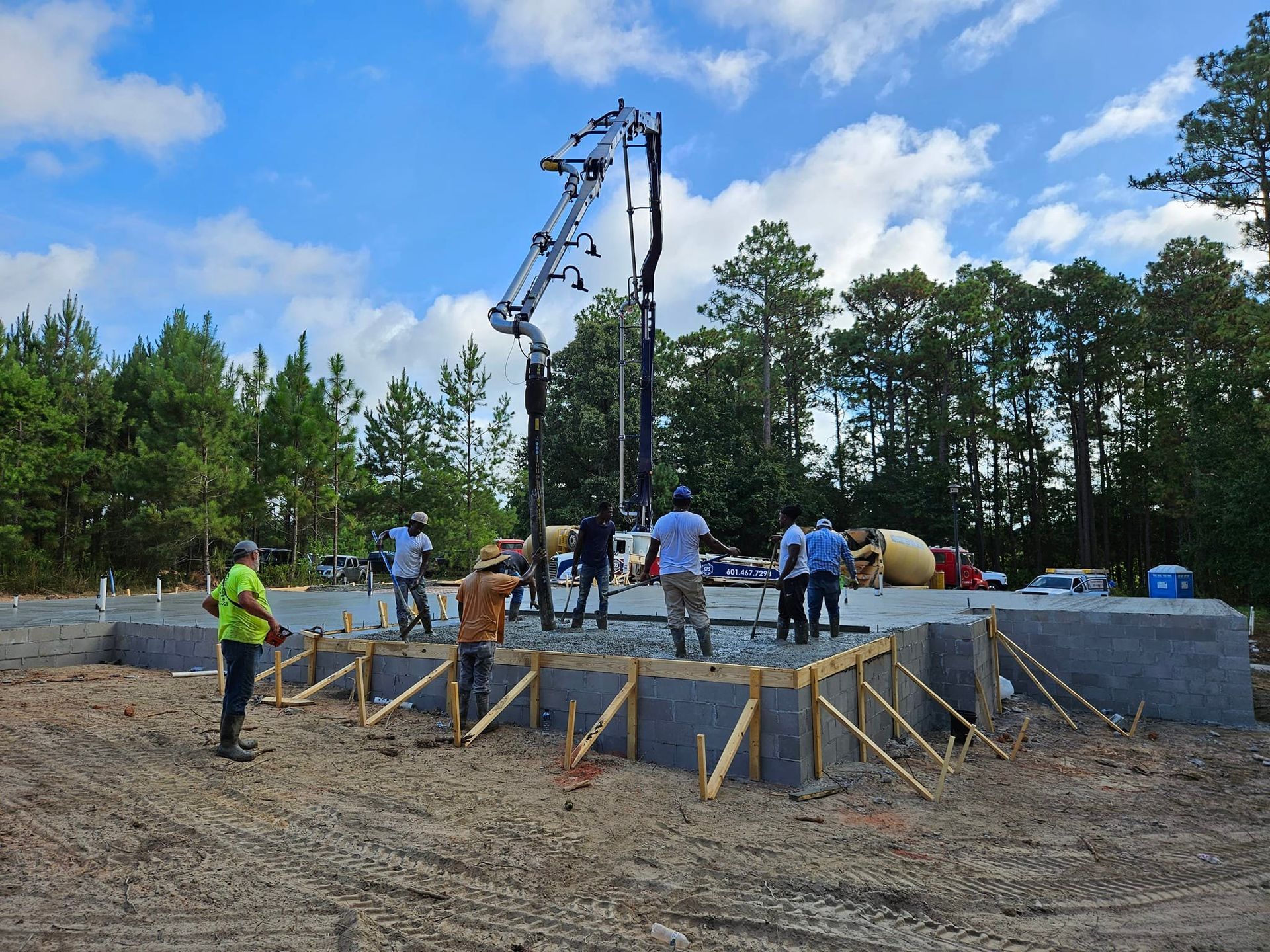 A group of people are working on a construction site