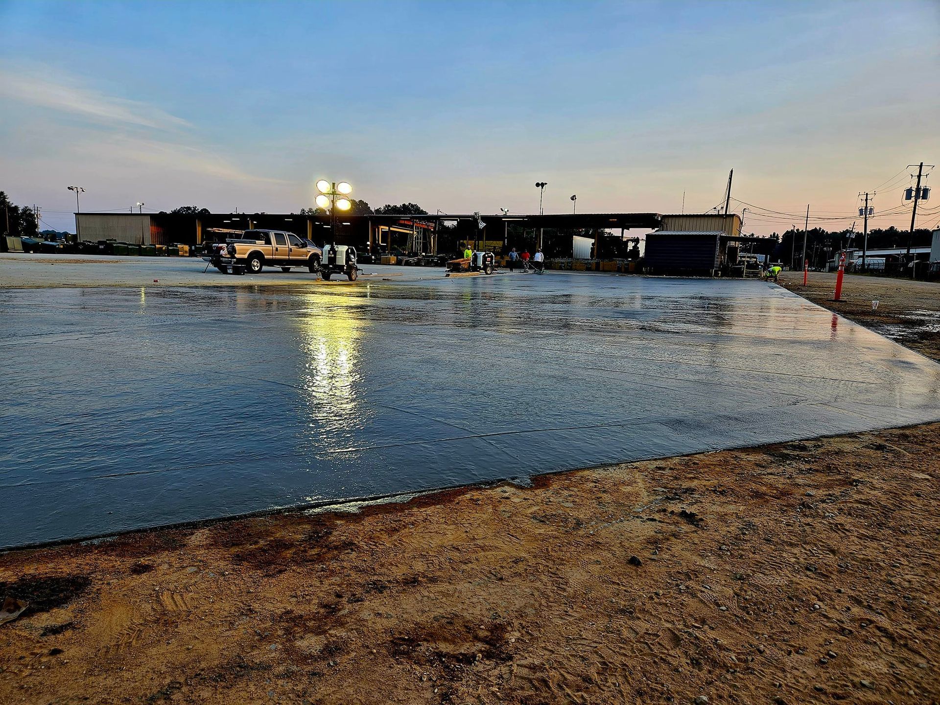 A large body of water is surrounded by a sandy beach.