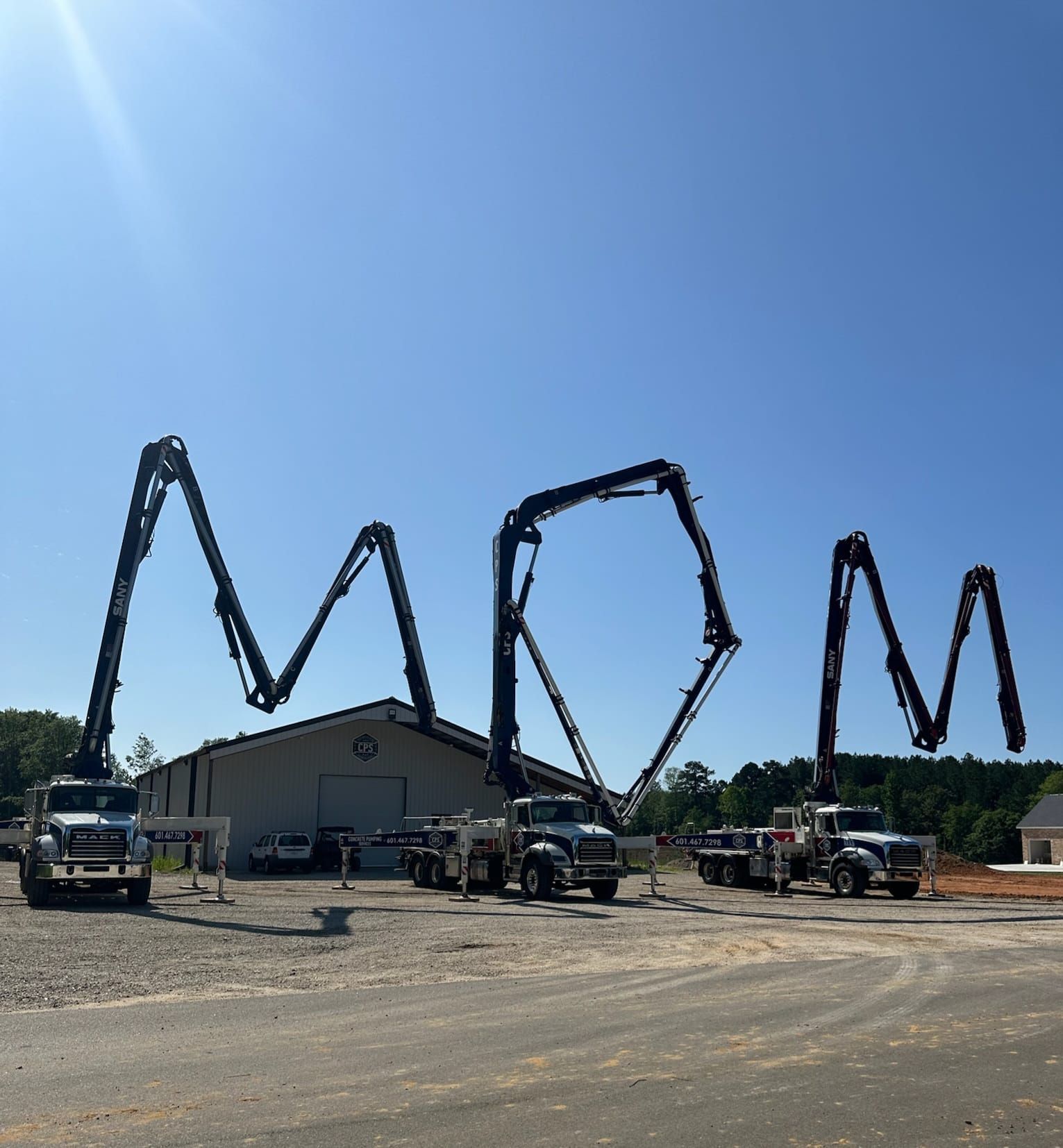 The word mom is written on the side of a road