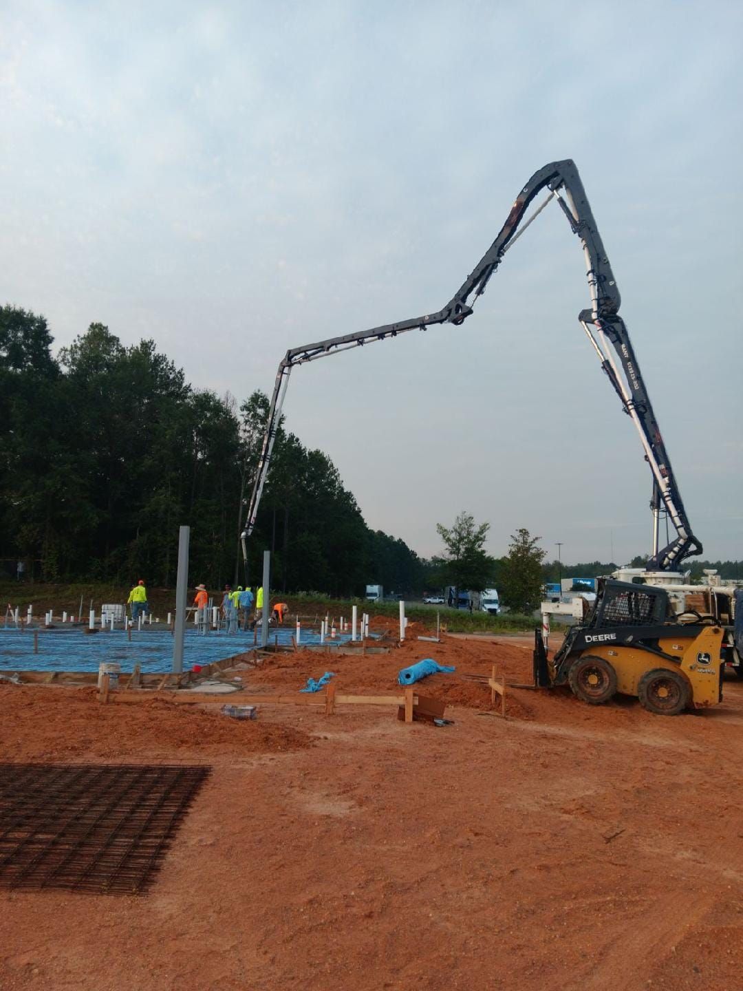 A concrete pump is being used on a construction site