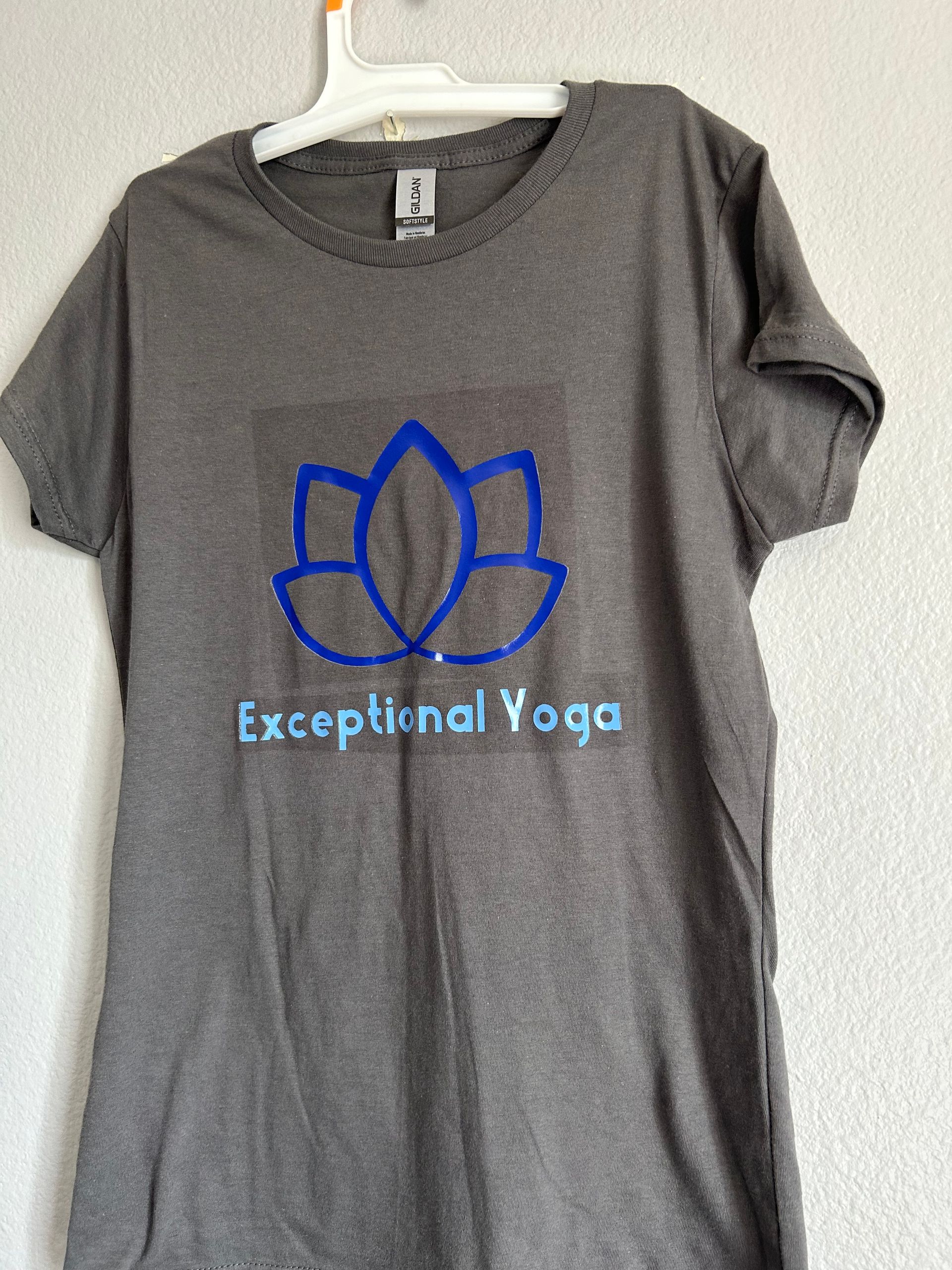 A t-shirt that says exceptional yoga on it