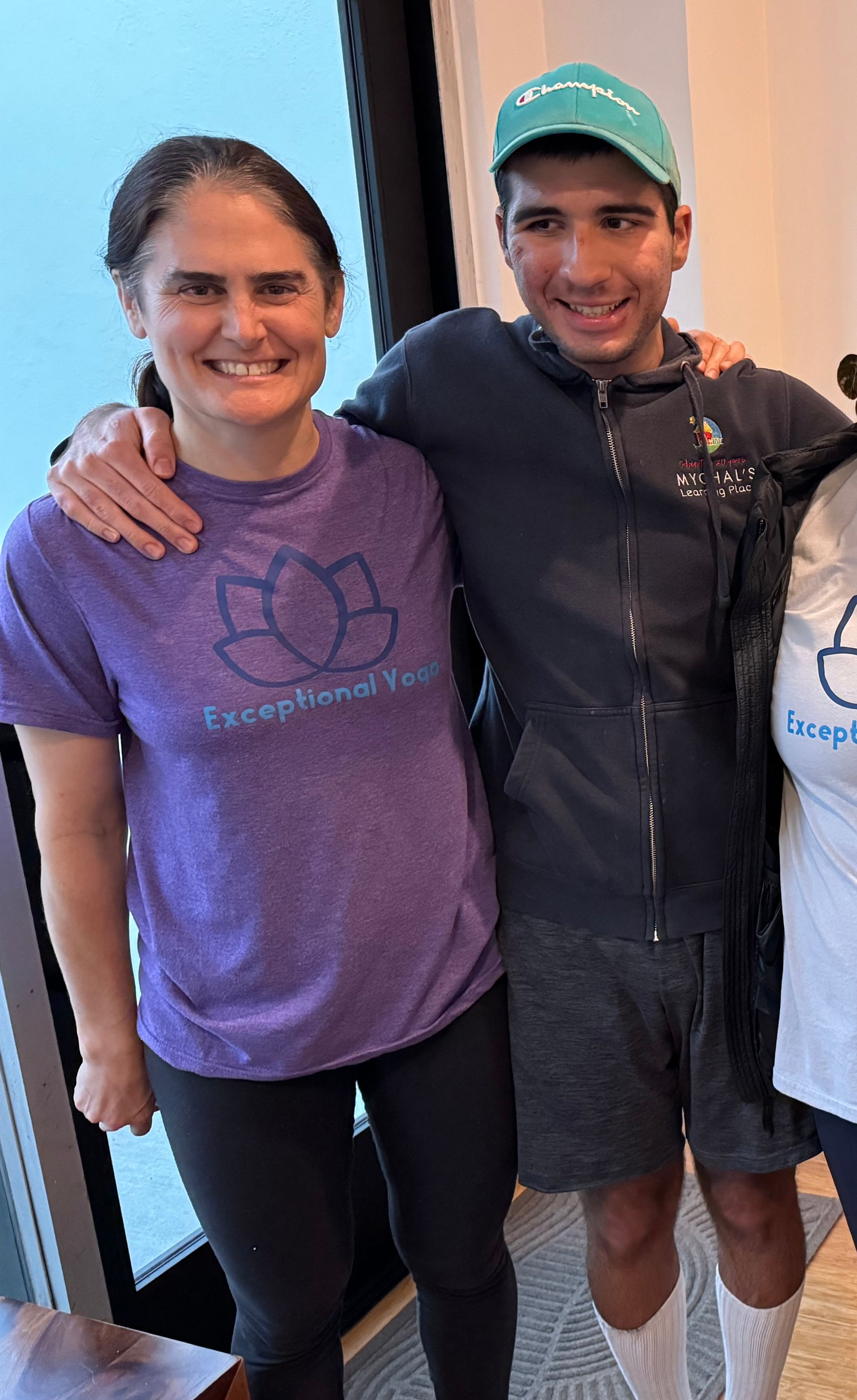 A man and a woman are posing for a picture together.