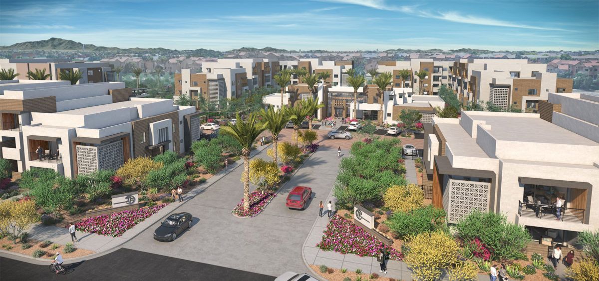 An aerial view of a city with lots of buildings and trees.