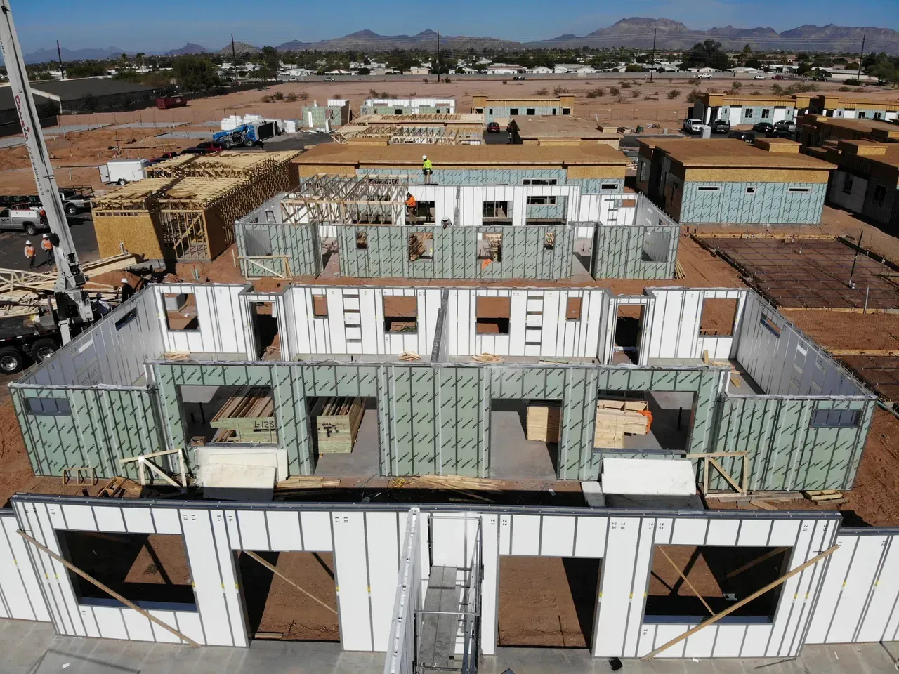 An aerial view of a large building under construction