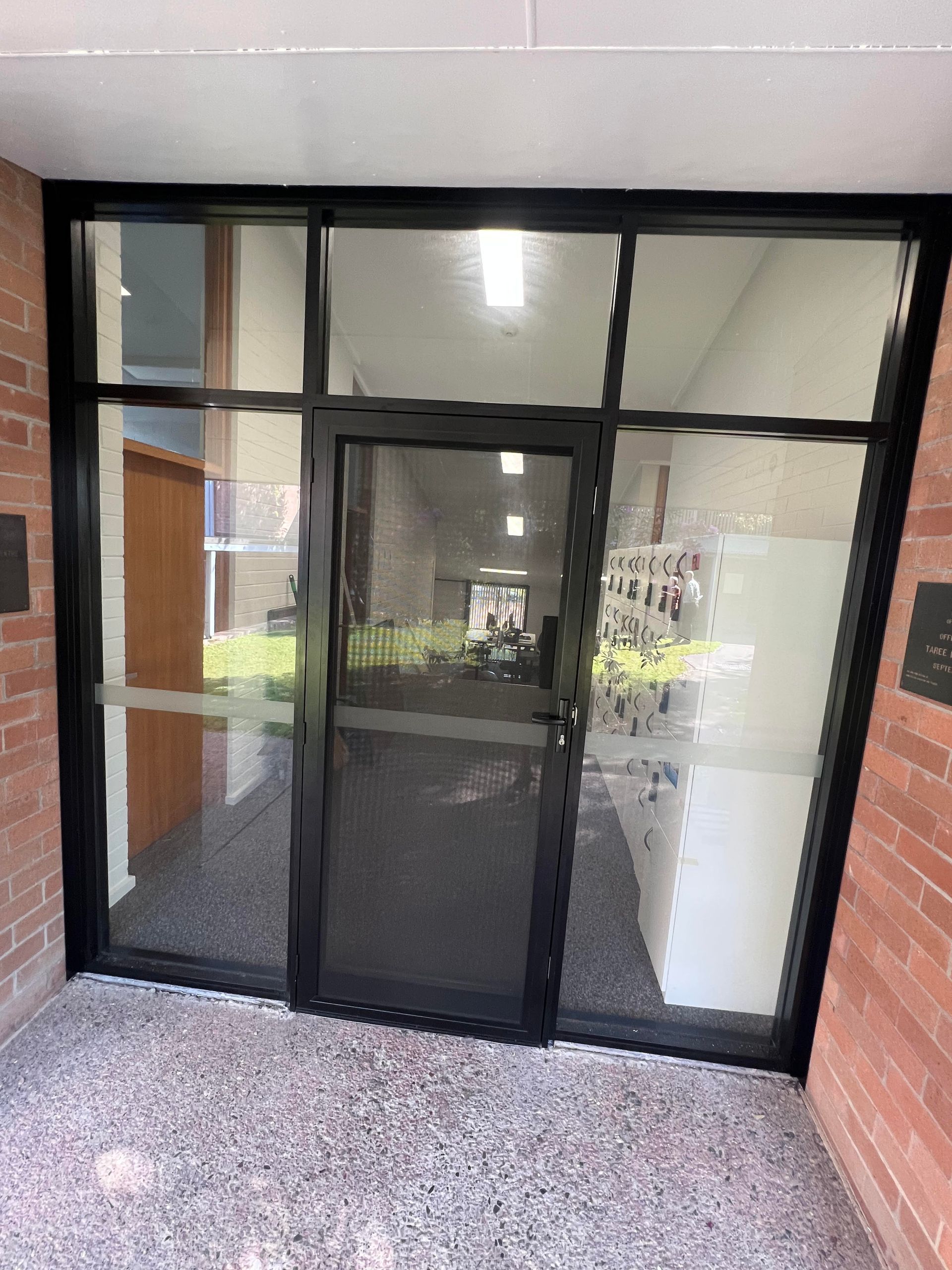 Glass Door With a Black Frame