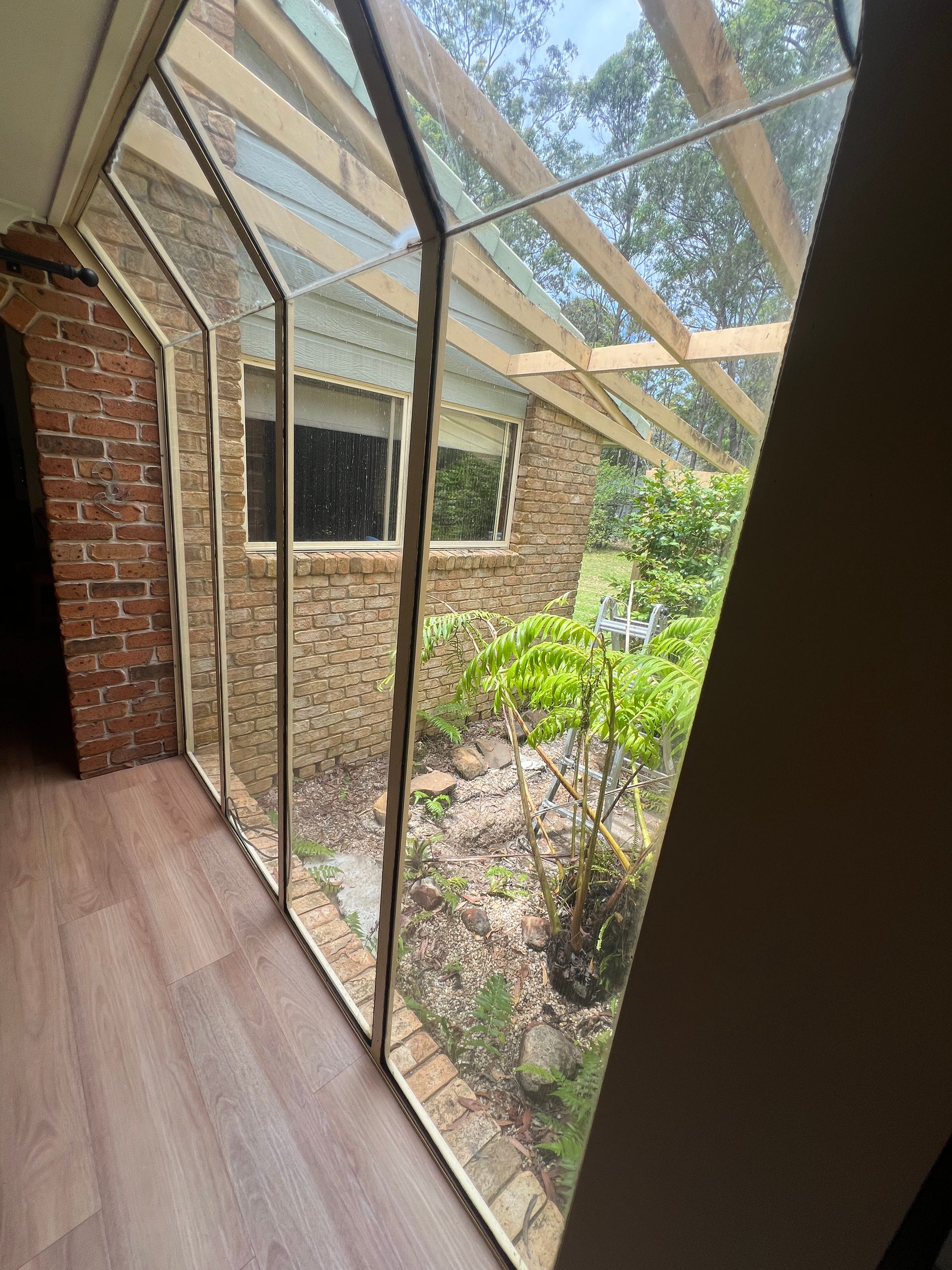 A Large Window With A Lot Of Blinds On It — Glass 24/7 In Taree, NSW