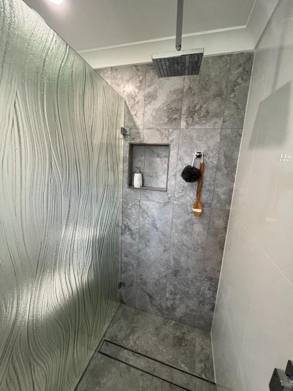 A Bathroom With A Walk In Shower And A Shower Head — Glass 24/7 In Old Bar, NSW