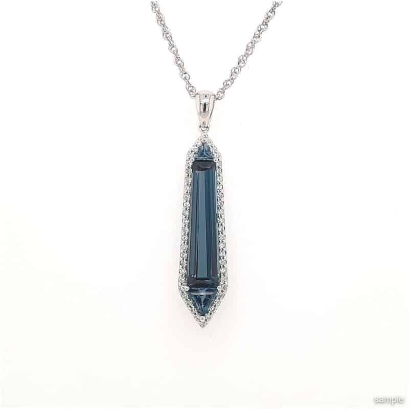 Blue gemstone pendant with white diamond halo on a silver chain.