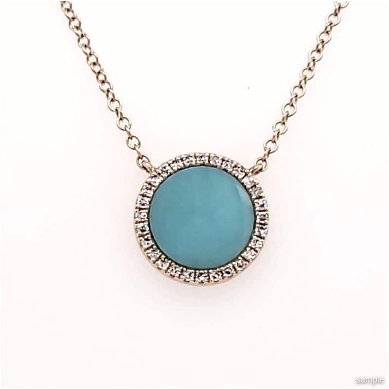 Silver necklace with a round turquoise stone pendant encircled by small white stones.