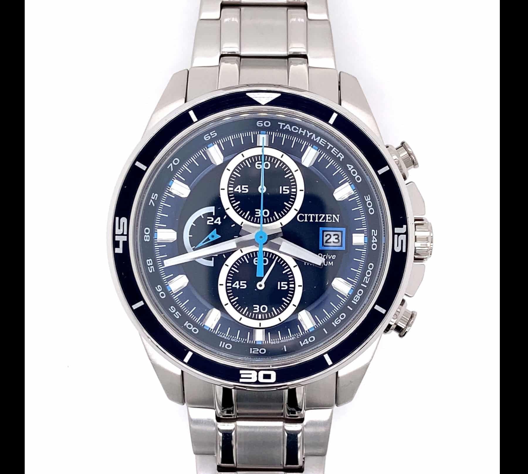 Silver Citizen watch with blue face, black bezel, and chronograph subdials.
