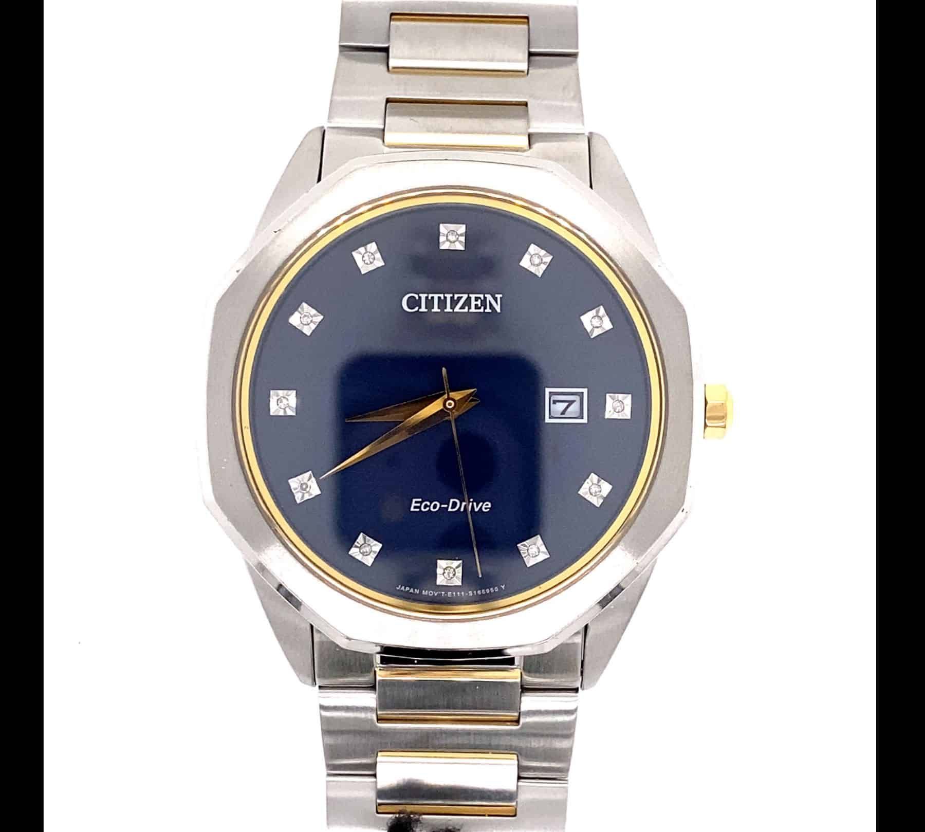 Citizen Eco-Drive watch with a blue face, diamond markers, and gold accents.