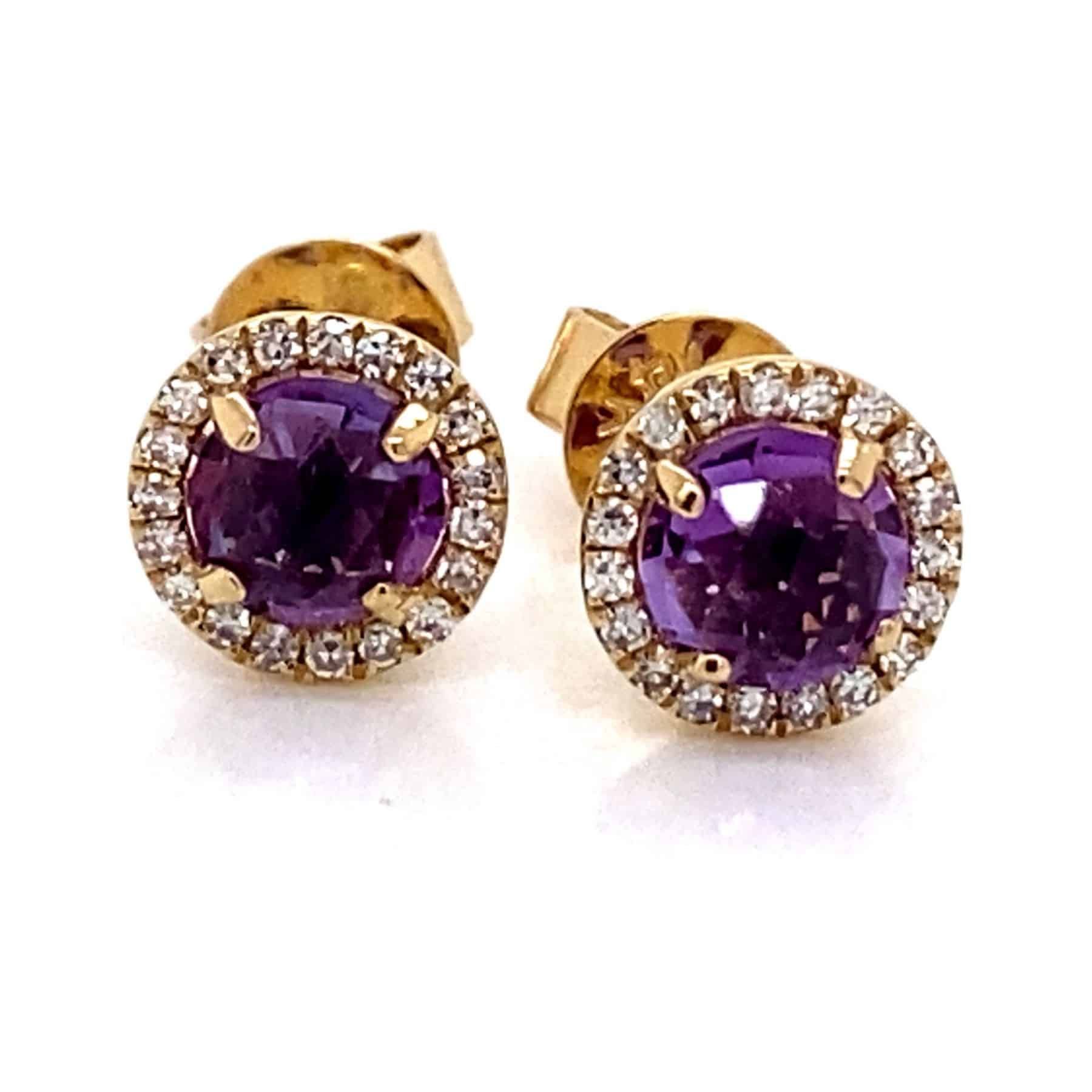 Gold stud earrings with round purple gemstones, surrounded by a diamond halo.