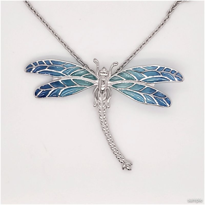 Silver dragonfly pendant necklace with blue enamel wings.