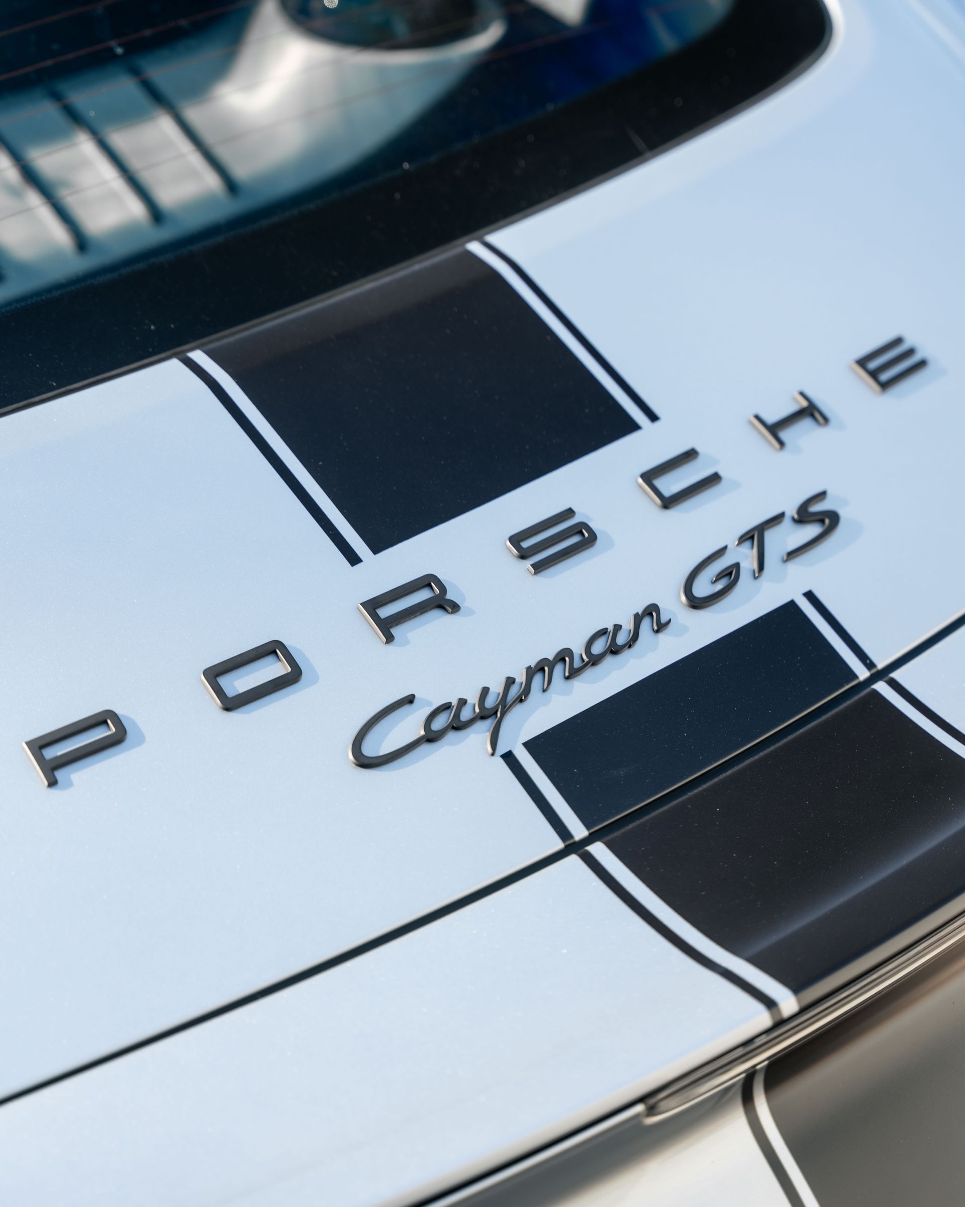 The hood of a porsche cayman gts