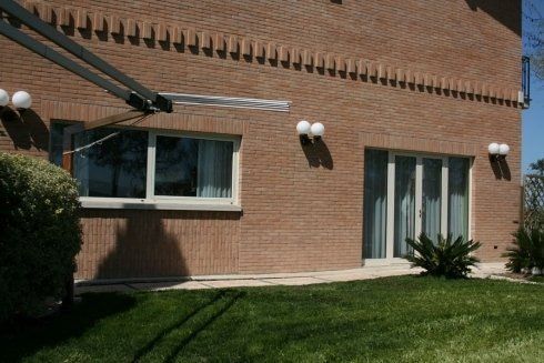 infissi su misura in legno e alluminio