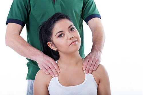 woman receiving a spinal rehab treatment | the woodlands, tx