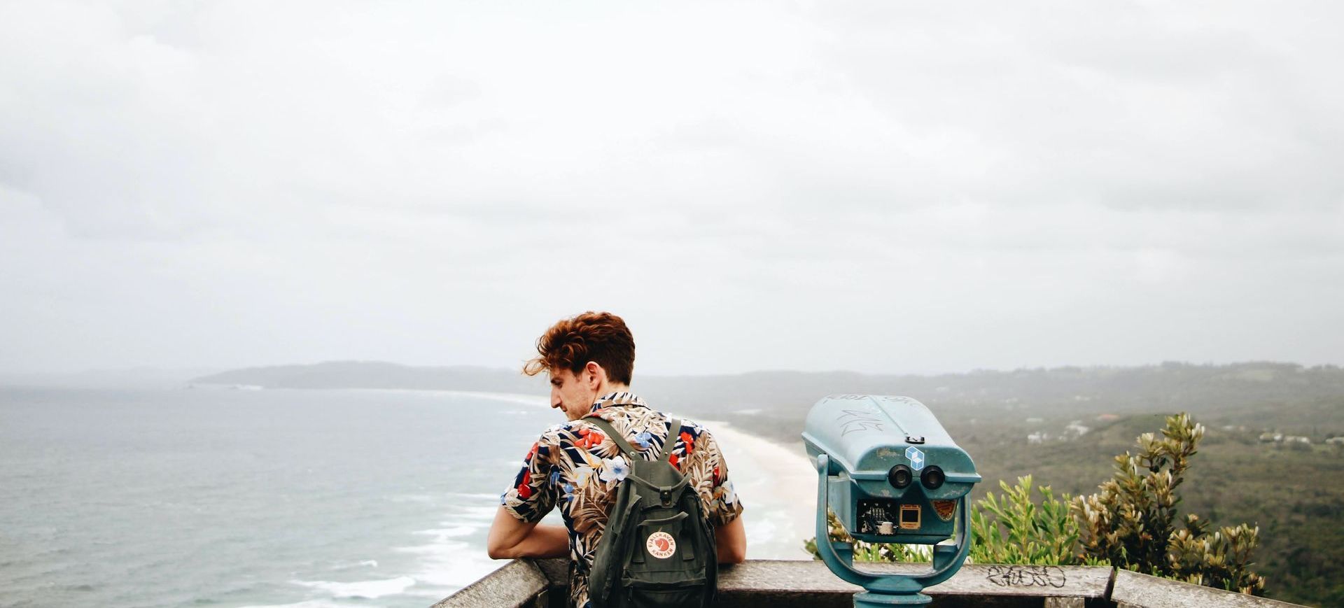 man wearing hawaiian shirt