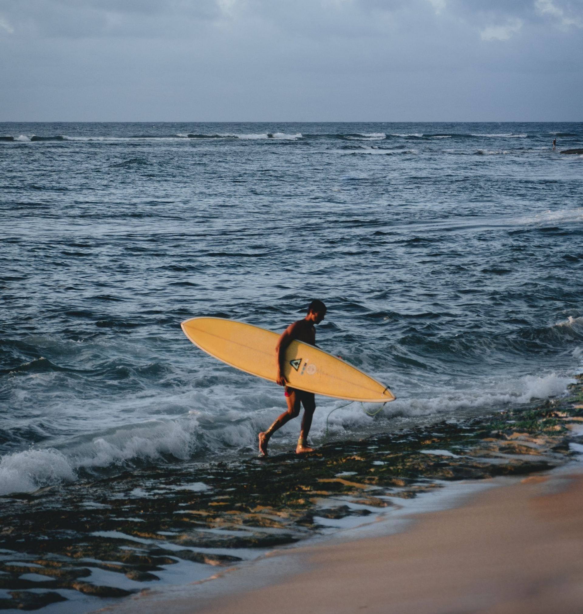 man with a surfboard