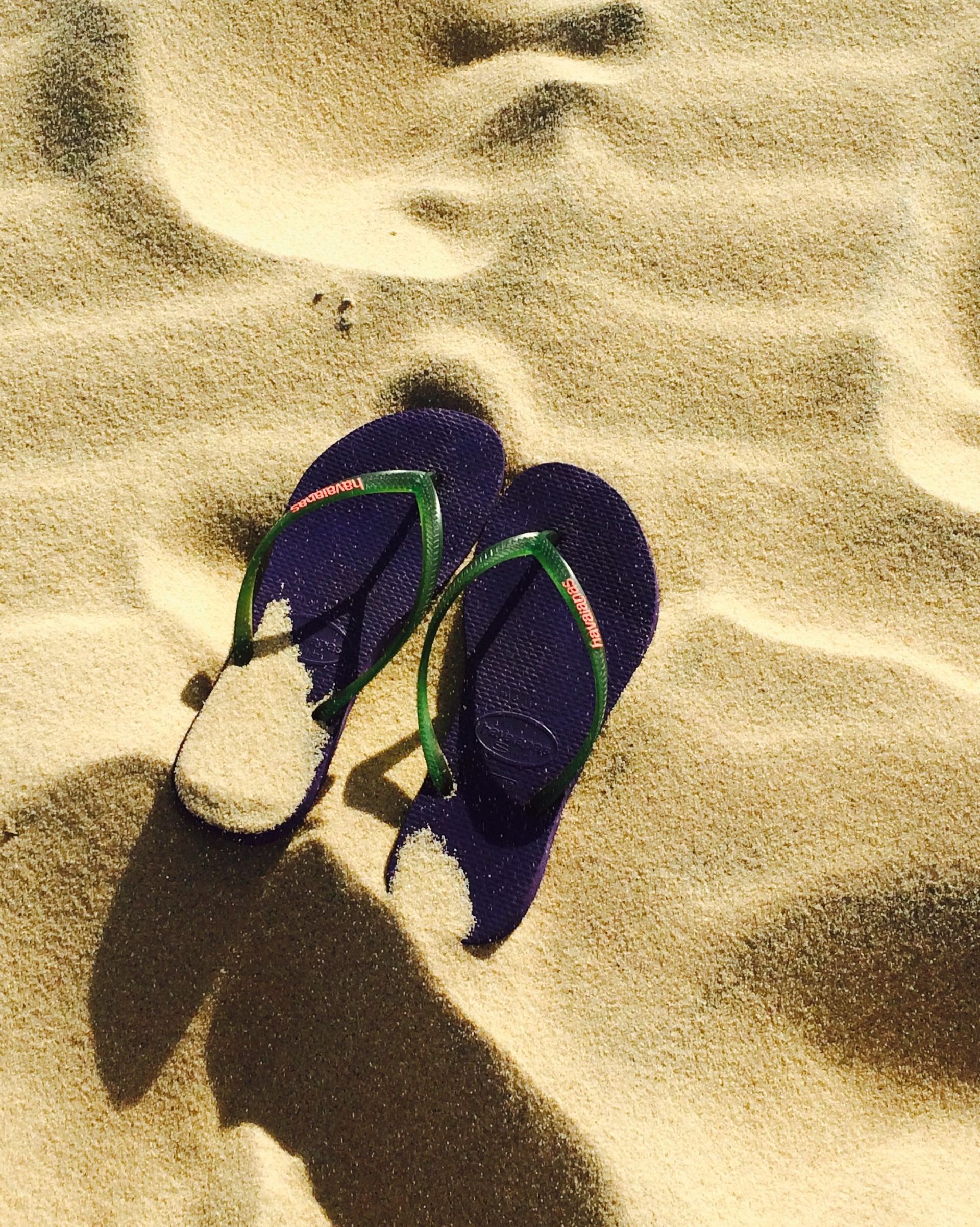 flip flops in the sand