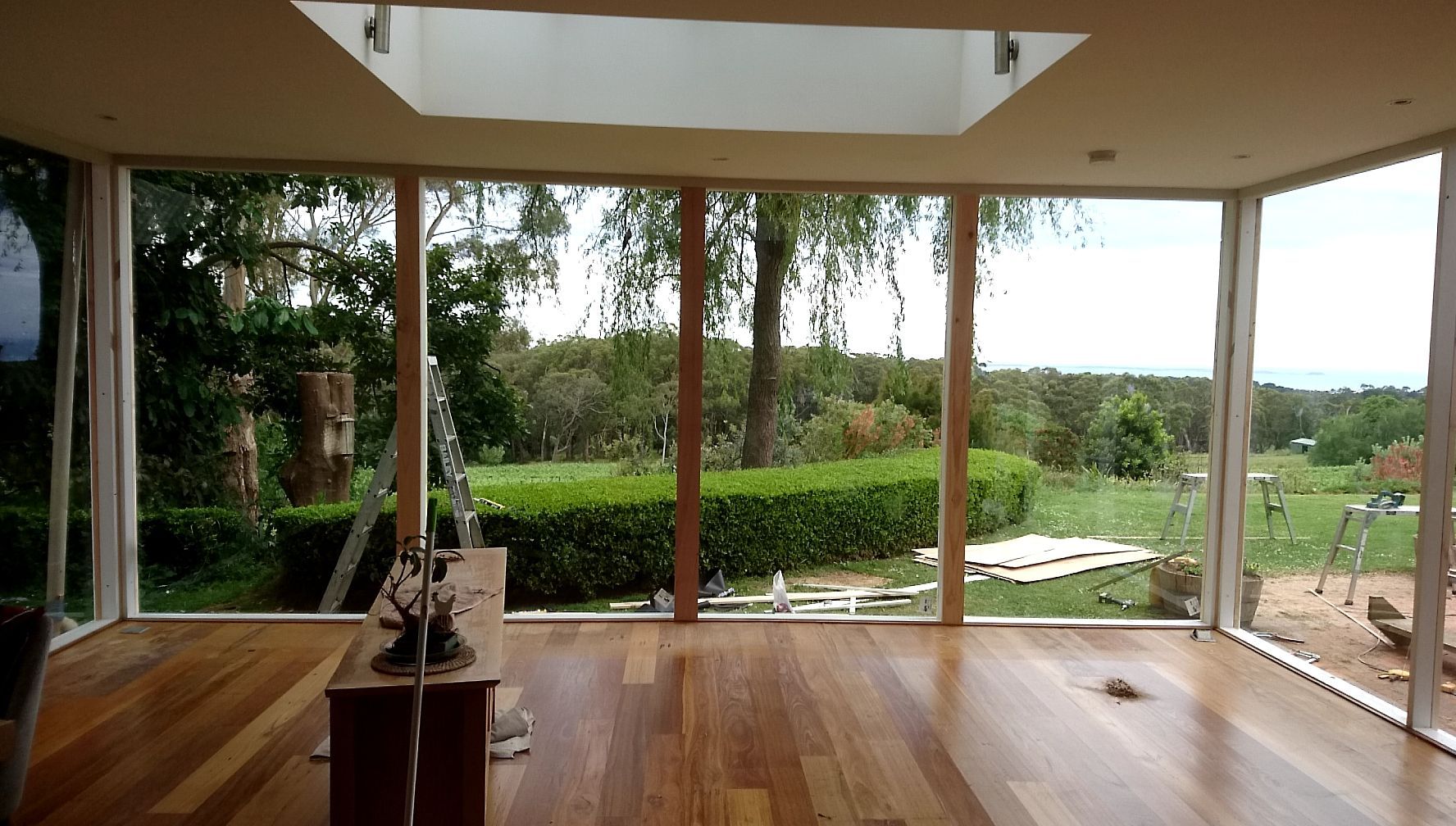 a room at a winery with a lot of windows and a skylight