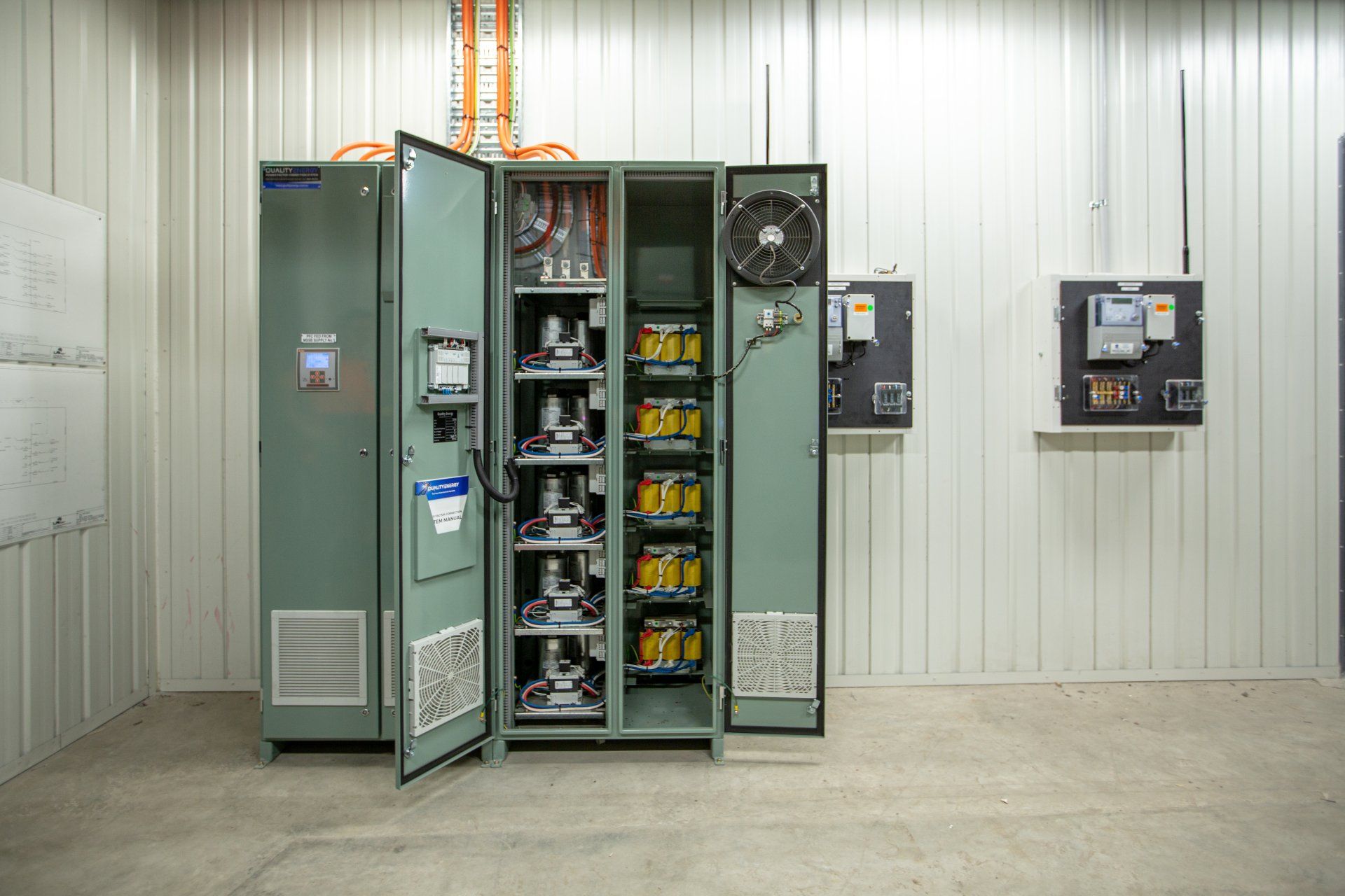 power factor correction unit showing capacitor banks in a factory