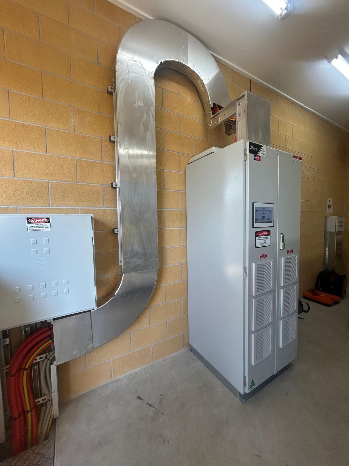 left view of active harmonic filter and cabling
