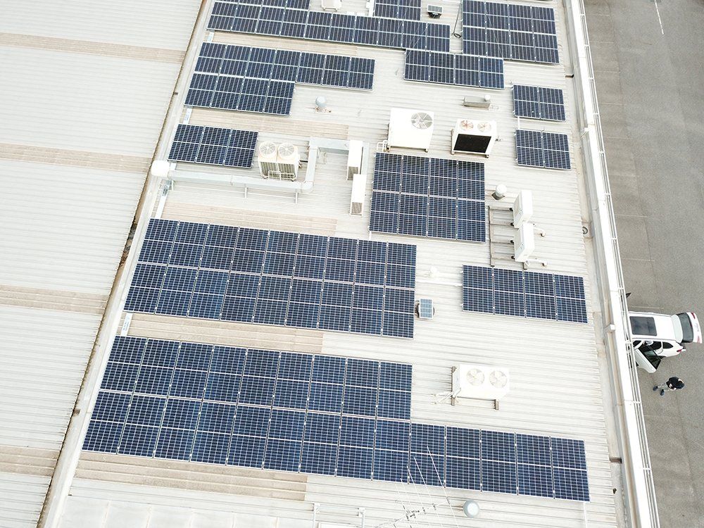Rolls of solar panels on a roof