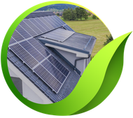Solar panels on a roof with a green leaf design.