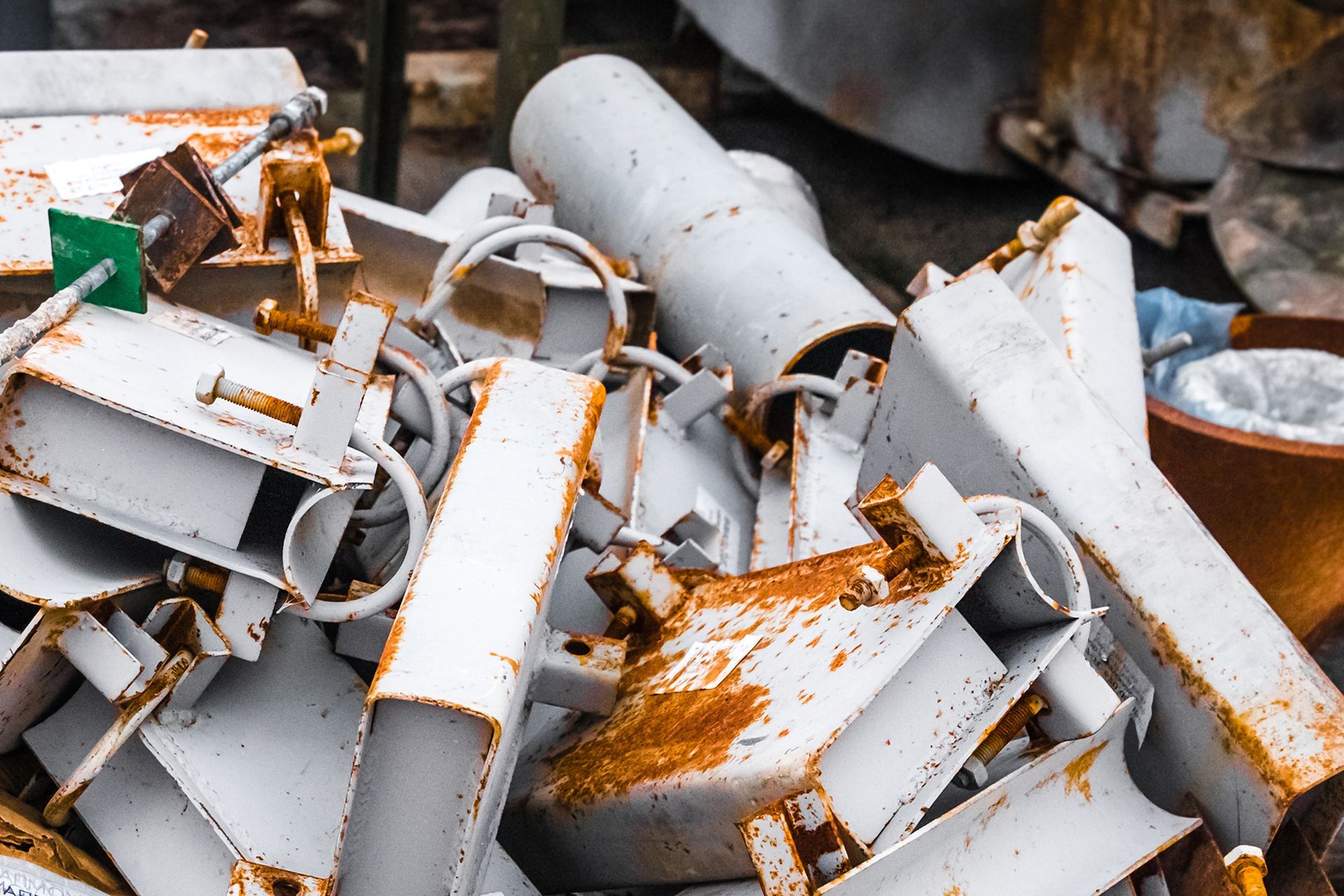 a pile of rusty metal objects sitting next to each other