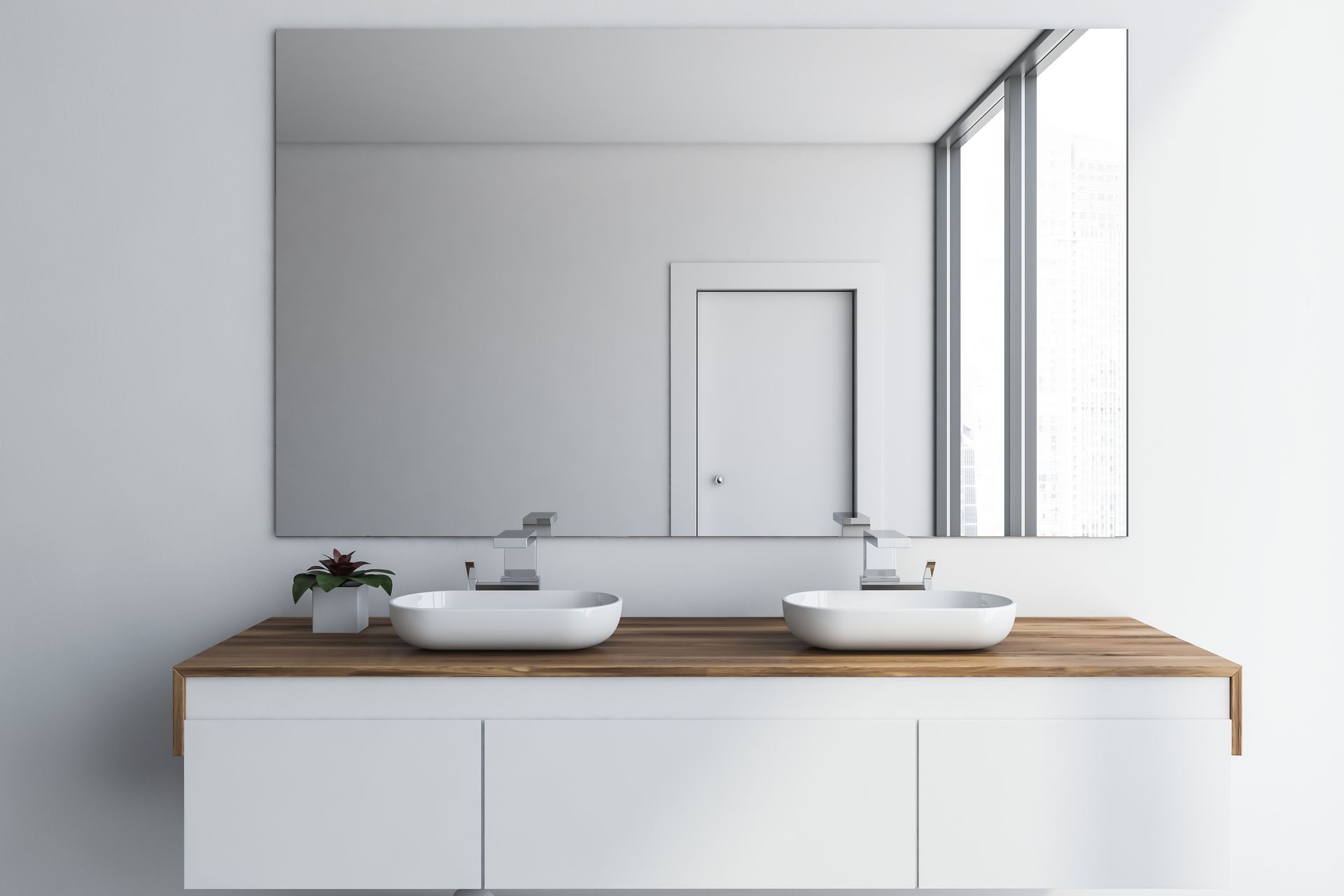 Minimalist bathroom vanity with double sinks, large mirror, and white and wood finishes — Hinch Plumbing In Breakwater, VIC