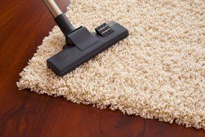 Cleaning Carpet With Vacuum Cleaner Dust Brush — Gilbert, AZ — All State Carpet & Tile Care