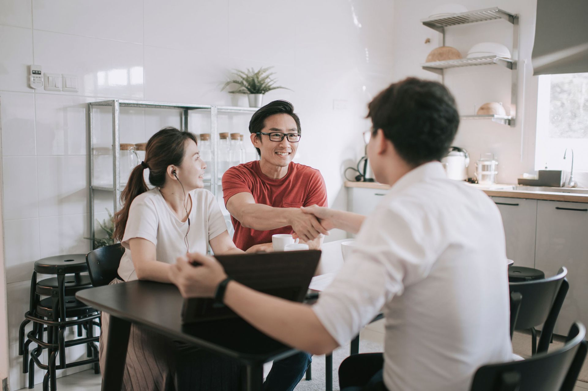 Insurance Agent with Clients — Richmond, VA — Virginia Insurance Group Inc. Richmond Insurance Services