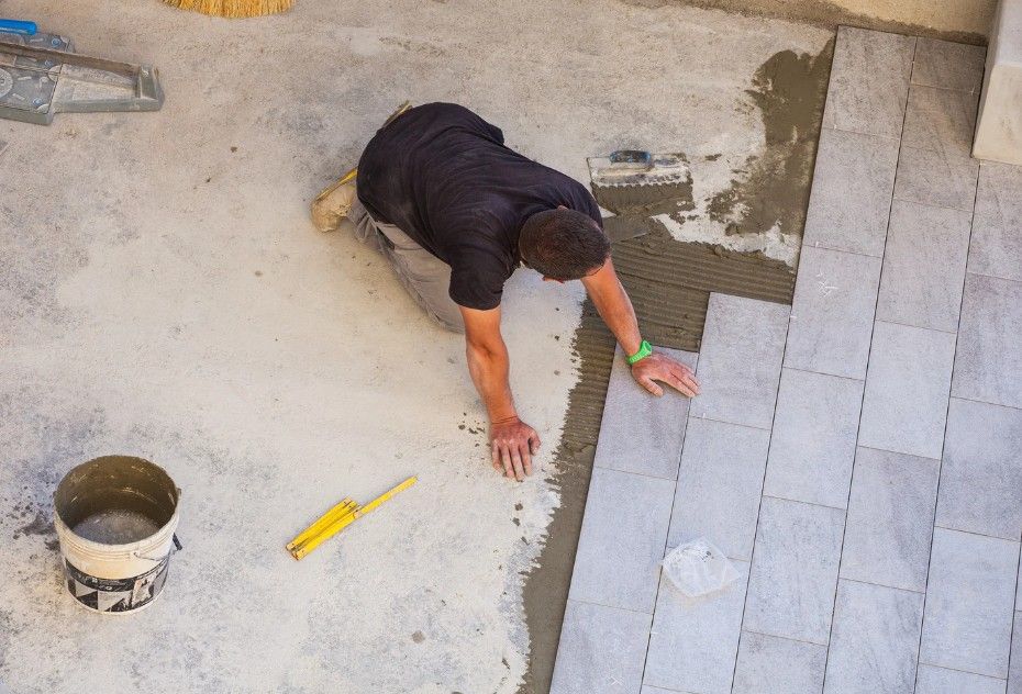 Derbyshire Tiling Specialists installing plank-style stone floor tiles in Derby