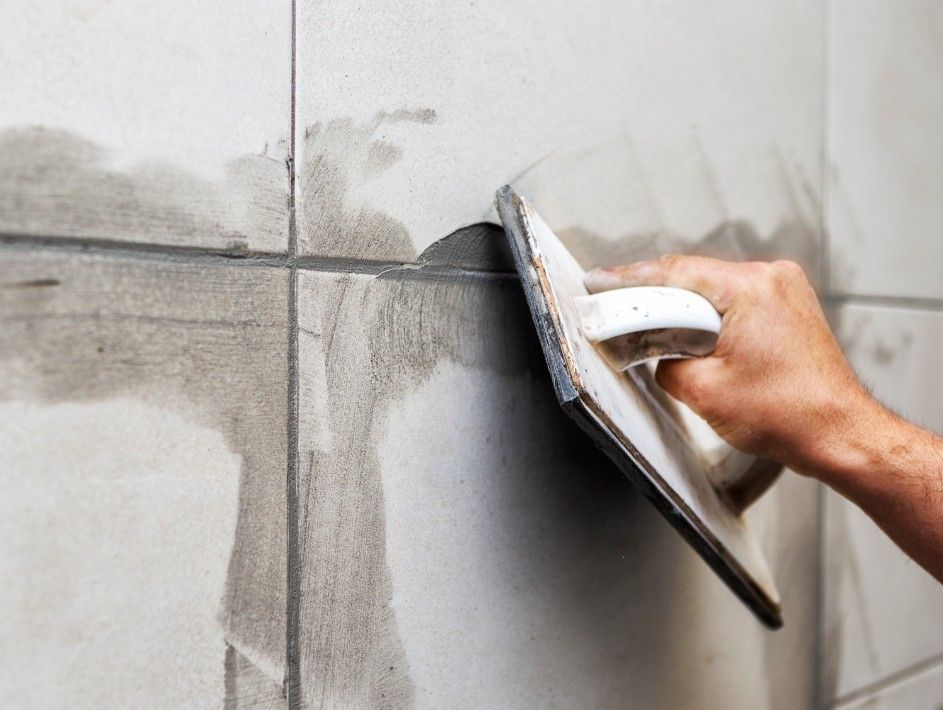 Derbyshire Tiling Specialists carrying out grout repair work in Derby