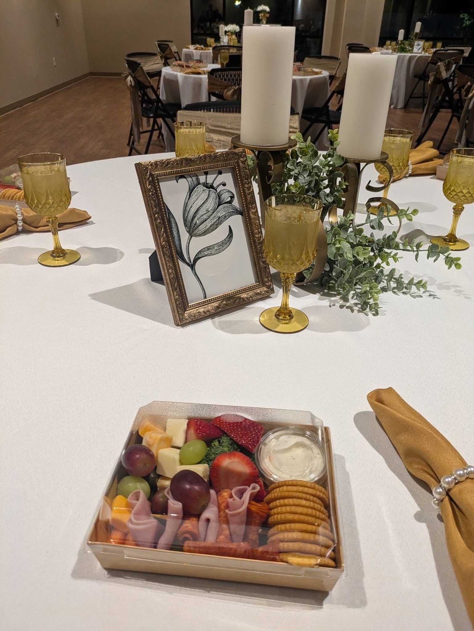 decorated feminin table  with  snacks displayed