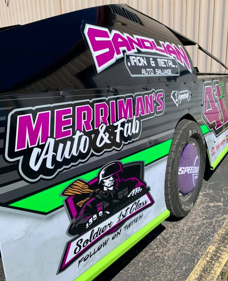 A race car with vehicle graphics