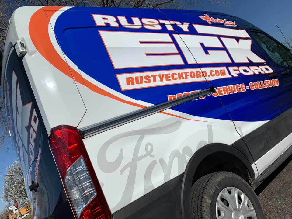 A van wrapped with vehicle graphics