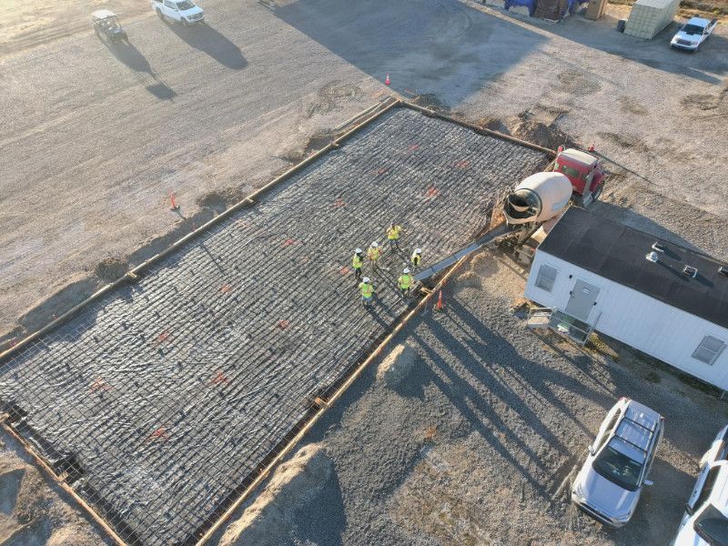 An aerial view of a construction site with workers