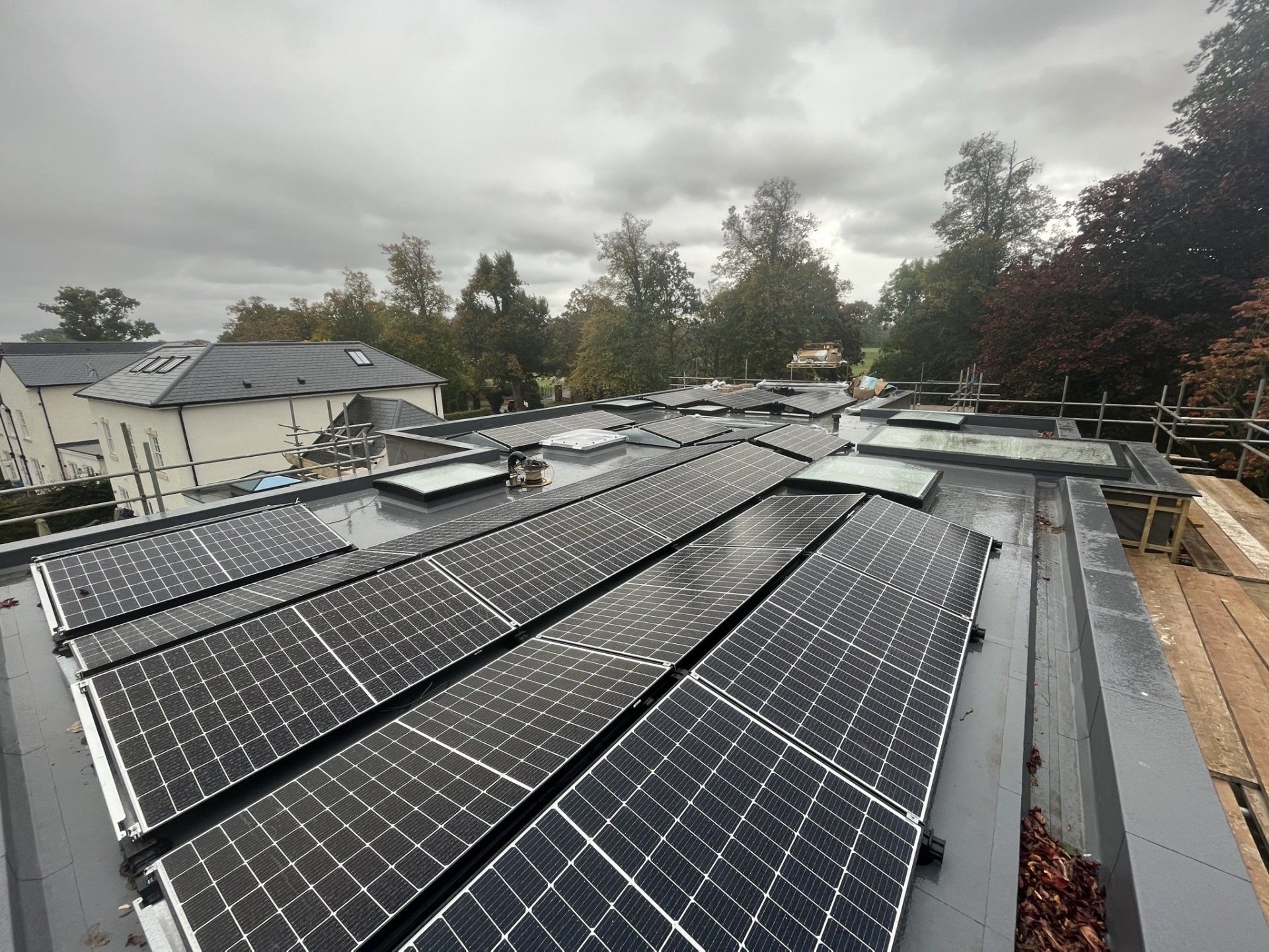 A roof with a lot of solar panels on it