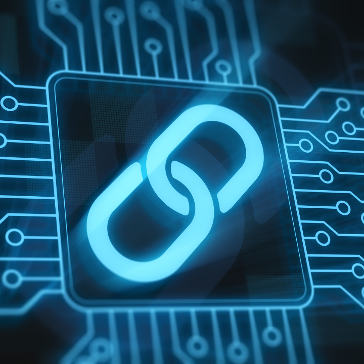 A blue link is glowing on a circuit board.