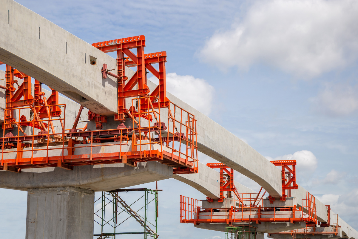 A bridge under construction with a blue sky in the background.