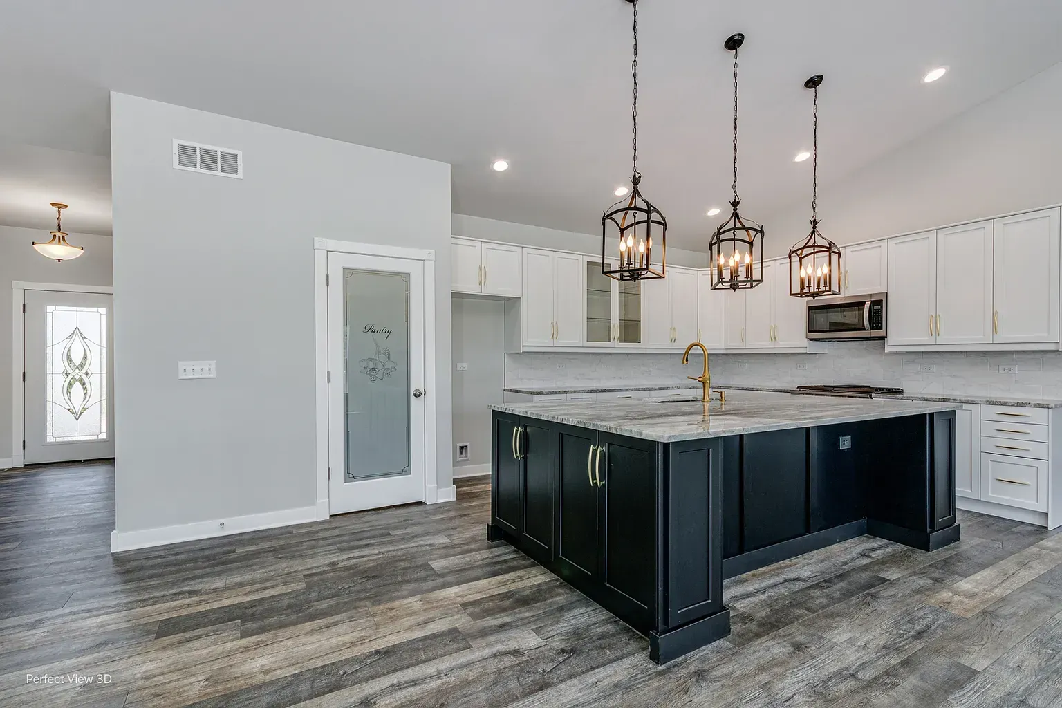Modern kitchen with black and white cabinets, large island, and dark backsplash.