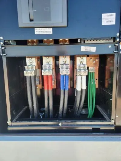 A bunch of wires are connected to a black box