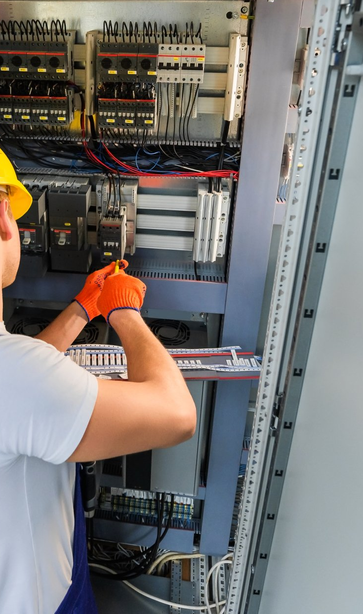 Electrician Working with Switchboard - Electrician in Northern Rivers, NSW